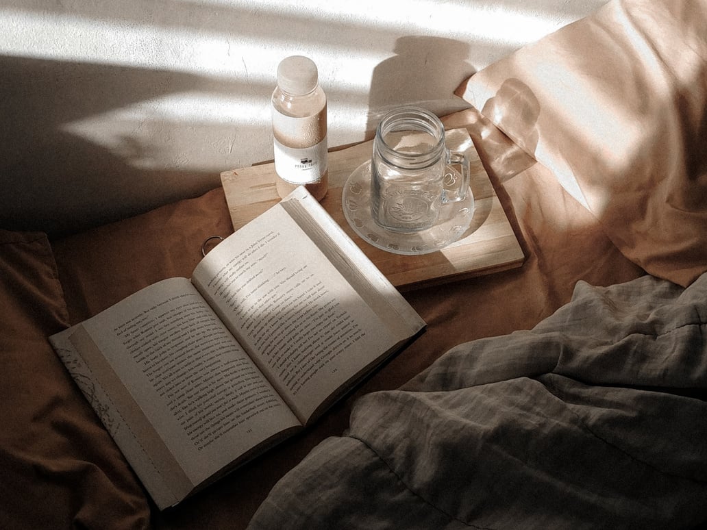 aesthetic coffee and book flatlay